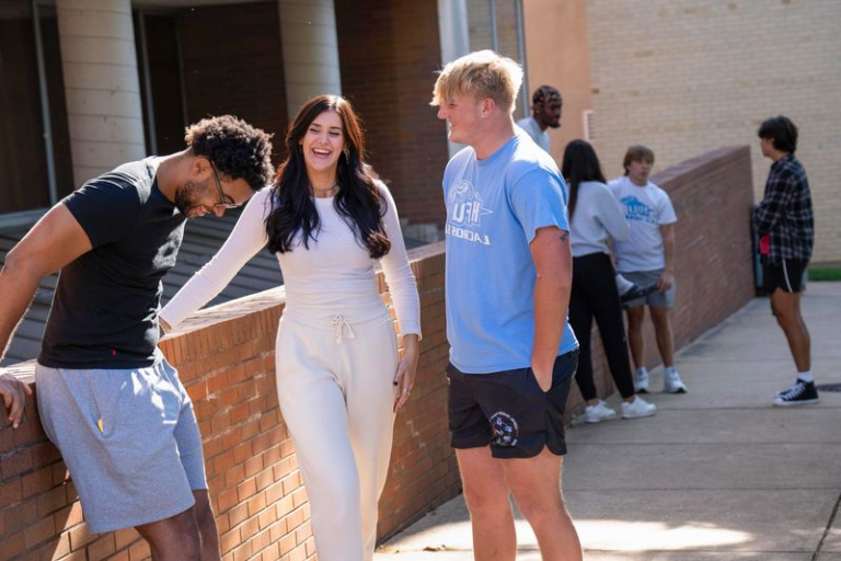 Holy Family University students hanging out and talking outside on campus